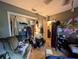 Cluttered bedroom with a ceiling fan, large window, and closet at 4345 Old Colony Rd, Mulberry, FL 33860