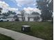 View of the front of the house from the street at 4345 Old Colony Rd, Mulberry, FL 33860