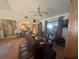 Comfortable living room with wood flooring, large windows, and an open layout at 4345 Old Colony Rd, Mulberry, FL 33860