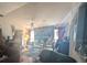 Gathering room with stone fireplace and large furniture at 4345 Old Colony Rd, Mulberry, FL 33860