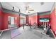 Spacious home gym equipped with a variety of exercise machines at 4726 Ashurst St, Kissimmee, FL 34758
