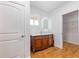 Updated bathroom with vanity, modern lighting, and closet at 4730 Cypress Creek Ranch Rd, St Cloud, FL 34771