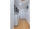 Functional laundry room with washer, dryer, overhead cabinets and utility sink at 4730 Cypress Creek Ranch Rd, St Cloud, FL 34771