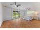 Spacious main bedroom with sliding doors to the backyard, featuring ample natural light and relaxing atmosphere at 4730 Cypress Creek Ranch Rd, St Cloud, FL 34771
