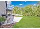Beautiful backyard with lush lawn, patio and landscaping, ideal for outdoor activities at 501 Dunoon St, Ocoee, FL 34761