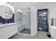 Modern bathroom with a glass-enclosed shower, vanity, and sleek fixtures at 501 Dunoon St, Ocoee, FL 34761