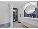 Contemporary bathroom featuring a walk-in shower, modern vanity, and stylish accents at 501 Dunoon St, Ocoee, FL 34761
