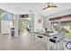Open dining room with views to the front entry and office space, with plenty of natural light at 501 Dunoon St, Ocoee, FL 34761