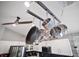 Pots hanging over an island with stainless steel appliances and white cabinets at 501 Dunoon St, Ocoee, FL 34761