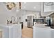 Updated kitchen with a central island, stainless steel appliances, and bright lighting at 501 Dunoon St, Ocoee, FL 34761