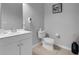 Bathroom featuring vanity with sink, mirror, toilet, and tile flooring at 5038 Tideview Cir # 21, Orlando, FL 32819