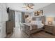 Bedroom with a balcony entrance, light wood dresser, and neutral decor at 5038 Tideview Cir # 21, Orlando, FL 32819