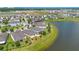 Enjoy this home's prime location with stunning water views and lush landscaping in a tranquil neighborhood at 5133 Chickadee St, St Cloud, FL 34771