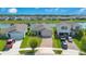 Beautiful aerial view of neighborhood homes with lake at 5133 Chickadee St, St Cloud, FL 34771