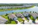 Aerial view of homes along a lake at 5133 Chickadee St, St Cloud, FL 34771