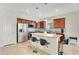 Well-appointed kitchen featuring stainless steel appliances, granite countertops, and a functional center island at 5133 Chickadee St, St Cloud, FL 34771