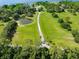 Sprawling estate with large pond and driveway at 5150 Gentry Oaks Pl, St Cloud, FL 34772