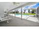 Enjoy this expansive outdoor space with a screened-in pool and plenty of room for seating at 5150 Gentry Oaks Pl, St Cloud, FL 34772