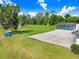 A screened-in pool and patio provide a tranquil oasis for relaxation and outdoor entertaining at 5150 Gentry Oaks Pl, St Cloud, FL 34772