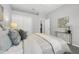 Spacious bedroom with soft carpet, a large bed, and elegant decor at 6479 Apple St, St Cloud, FL 34771