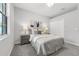 Cozy secondary bedroom with closet space and two nightstands at 6479 Apple St, St Cloud, FL 34771