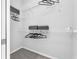 Walk-in closet features ample storage space with wire shelving and hanging racks at 6479 Apple St, St Cloud, FL 34771