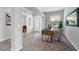Stylish entryway featuring tile floors, a modern desk, and an inviting ambiance, perfect for greeting guests at 6479 Apple St, St Cloud, FL 34771