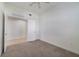 Bright bedroom features a closet with carpet floors and neutral paint colors at 7468 Excitement Dr # 101, Reunion, FL 34747