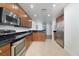 Well-appointed kitchen with stainless steel appliances and convenient layout at 7468 Excitement Dr # 101, Reunion, FL 34747