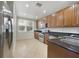 Modern kitchen featuring stainless steel appliances, and ample cabinet space at 7468 Excitement Dr # 101, Reunion, FL 34747