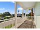 This balcony overlooks the neighborhood and street at 7740 Linkside Loop, Reunion, FL 34747