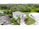 Aerial view of a well-maintained two-story home with a spacious backyard in a tranquil neighborhood at 805 Suffolk Pl, Davenport, FL 33896