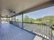 A screened balcony offers a relaxing outdoor space with green views and access to a pool at 805 Suffolk Pl, Davenport, FL 33896