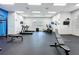 Bright gym with weight machines, treadmills, and ample workout space for residents at 805 Suffolk Pl, Davenport, FL 33896