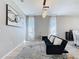 Comfortable living room boasts a modern sofa, stylish rug, and plenty of natural light at 805 Suffolk Pl, Davenport, FL 33896