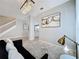 Stylish living room featuring a modern chandelier and hardwood floors at 805 Suffolk Pl, Davenport, FL 33896