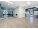 Well-lit lobby with glass doors, water fountains, and an archway leading to the exit at 805 Suffolk Pl, Davenport, FL 33896