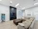 Inviting lounge featuring a modern entertainment center, comfortable seating, and abundant natural light at 805 Suffolk Pl, Davenport, FL 33896