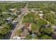 Aerial view of a home with a backyard pool, situated in a neighborhood close to major roads and highways at 807 E Airport Blvd, Sanford, FL 32773