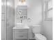 Updated bathroom featuring a glass shower, stylish vanity with vessel sink, and a toilet at 807 E Airport Blvd, Sanford, FL 32773