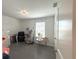 Clean and spacious bedroom with natural light, offering a versatile area at 921 Spring Palms Loop, Orlando, FL 32828