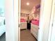 Neat walk-in closet with shelves, drawers, and storage for an organized wardrobe at 921 Spring Palms Loop, Orlando, FL 32828