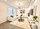 Inviting living room featuring a comfortable sectional sofa and elegant decor at 921 Spring Palms Loop, Orlando, FL 32828