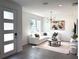 Bright living room boasts a modern light fixture, large windows, plush sofa, and a round coffee table at 921 Spring Palms Loop, Orlando, FL 32828