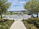 Well-maintained parking area offering accessible parking, pond view, and neatly landscaped surroundings at 921 Spring Palms Loop, Orlando, FL 32828