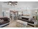 Open-concept living room featuring a kitchen island and seating, and a dining area at 1139 Seedorf Dr, Winter Haven, FL 33881