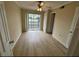 Bedroom with ceiling fan, closet, and sliding glass doors to balcony at 115 Oyster Bay Byu # 115, Altamonte Springs, FL 32701