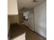 Functional kitchen with white cabinetry and neutral countertops at 115 Oyster Bay Byu # 115, Altamonte Springs, FL 32701