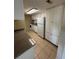 Functional kitchen with white cabinetry and neutral countertops at 115 Oyster Bay Byu # 115, Altamonte Springs, FL 32701