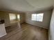 Sunlit living room with wood-look floors at 115 Oyster Bay Byu # 115, Altamonte Springs, FL 32701
